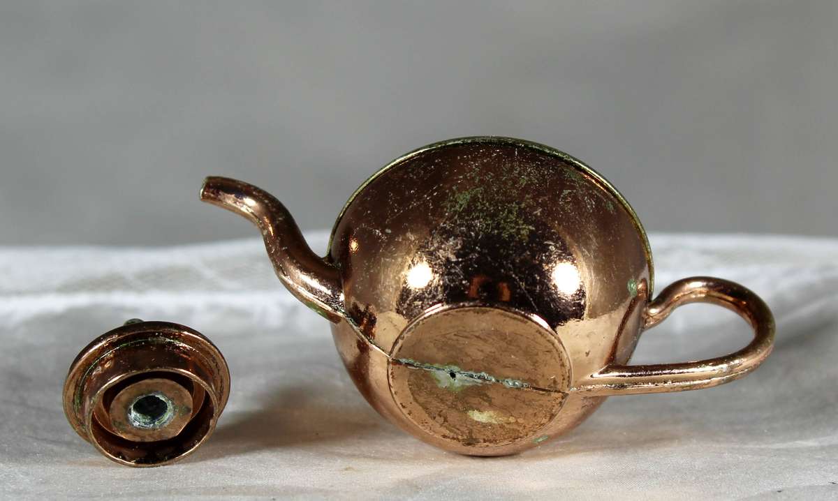 Miniature brass and copper teapot