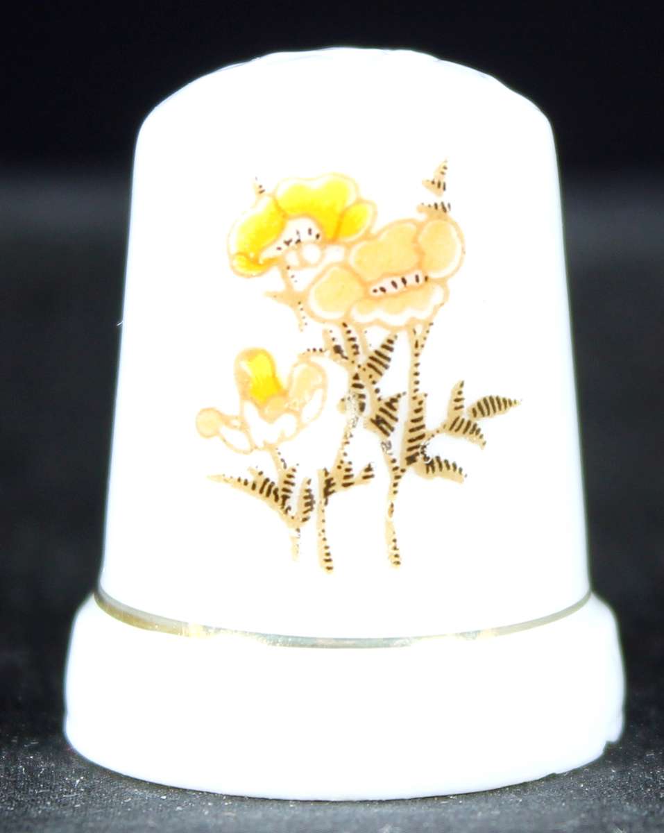 Porcelain thimble - yellow flowers