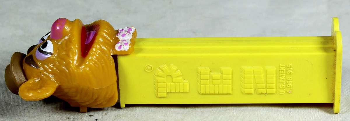 Collectible PEZ candy dispenser - Fozzie bear from the Muppet show
