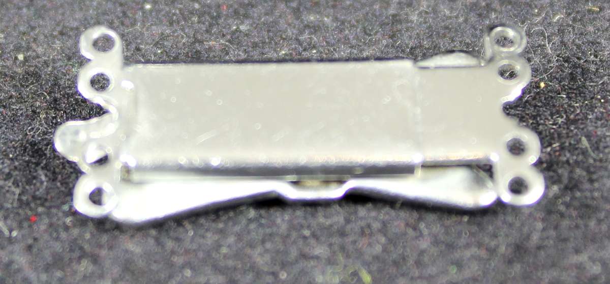 costume jewelry - diamante bow-tie pendant