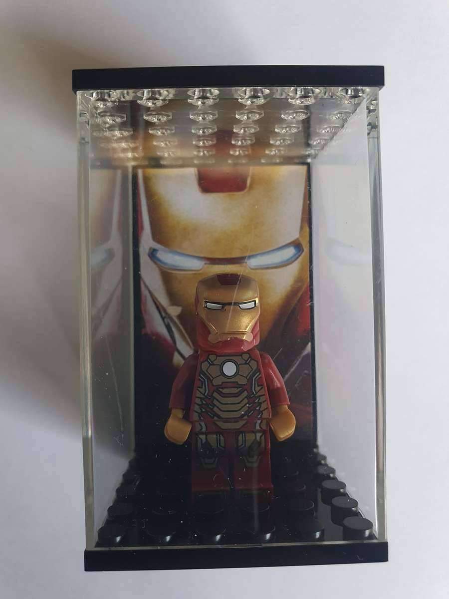 lego iron man figurine in lego box.