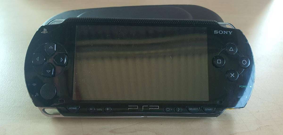 PSP 1004 with pouch, Working with new battery