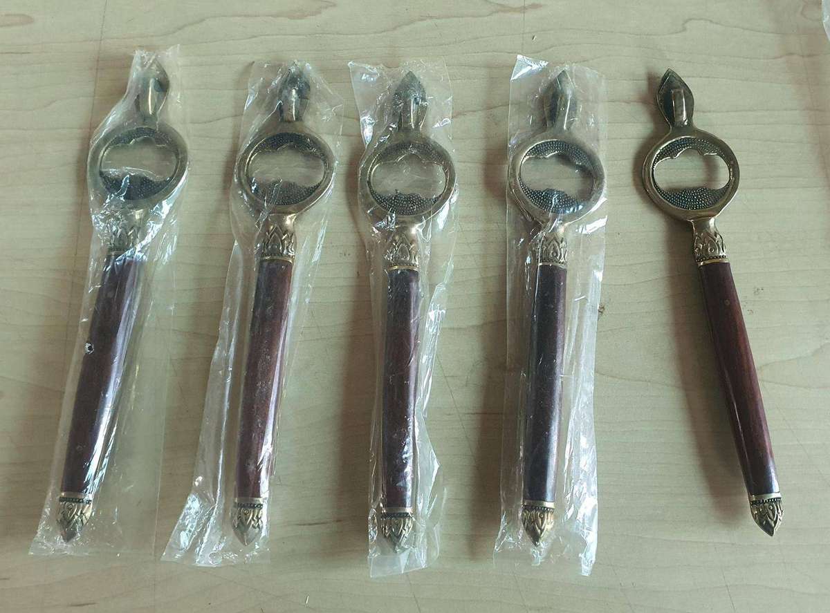 Antique Brass bottle openers lot off 5 one price for all.