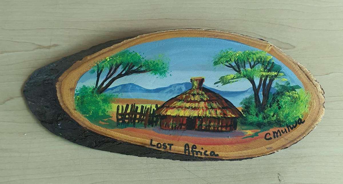 Painting on wood stump Lost Africa