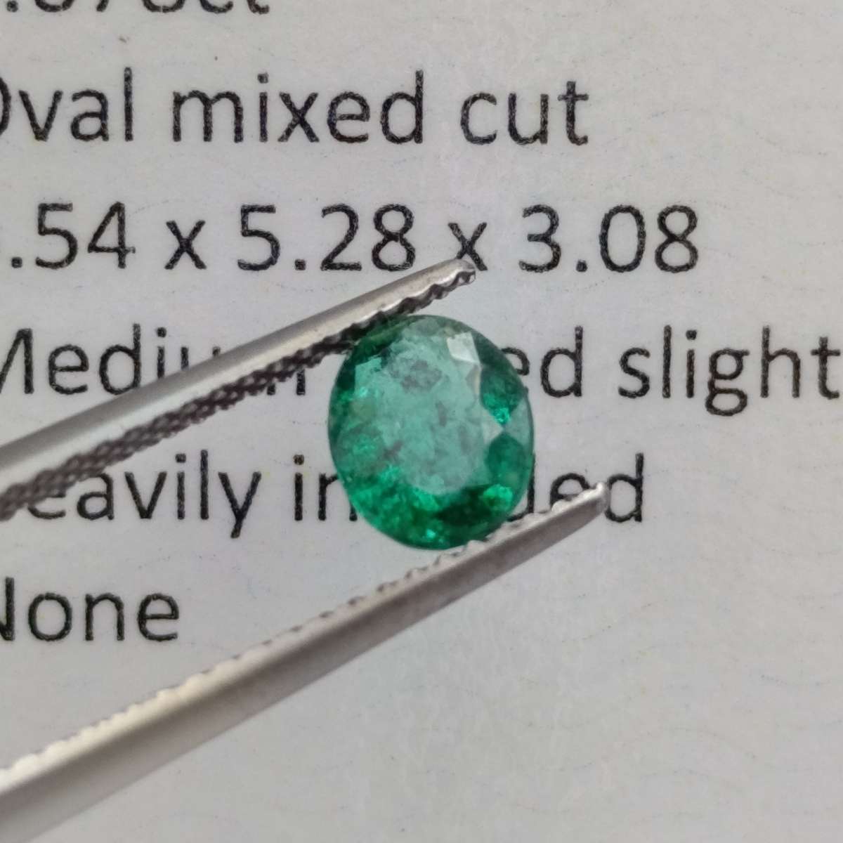 Natural Emerald of 0.68 carat oval mixed cut slight blueish green with Gemlab certificate