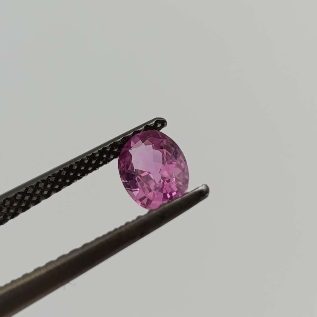 Natural slight violet pink sapphire oval mixed cut 0.81 carat with Gemlab certificate
