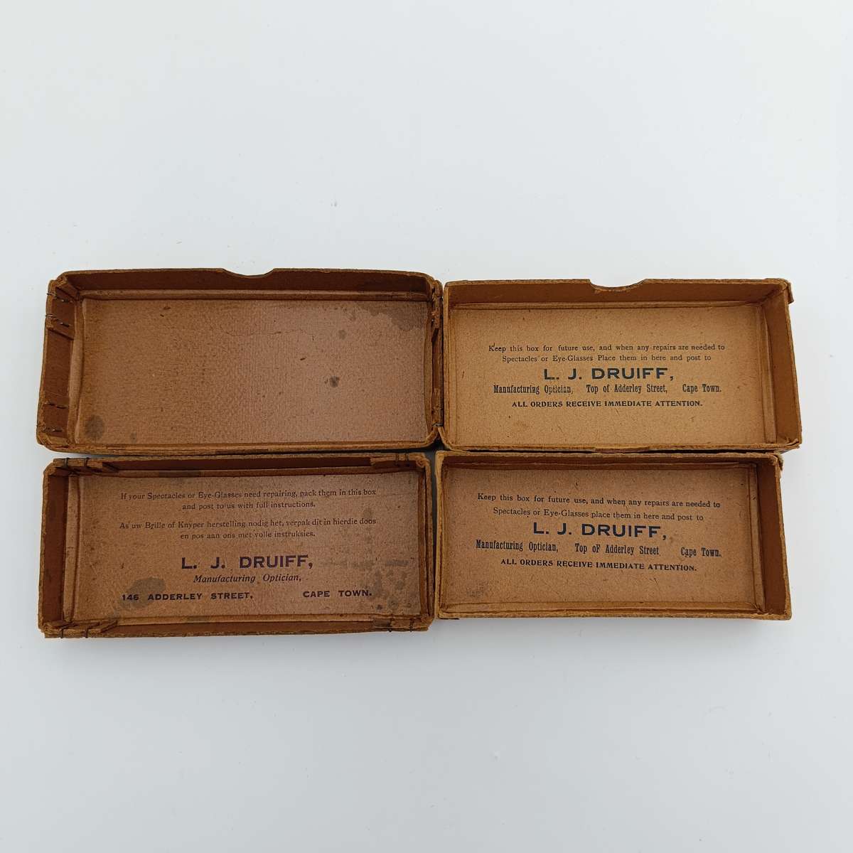 Pair of LJ Druiff Cape Town optician delivery boxes - vintage