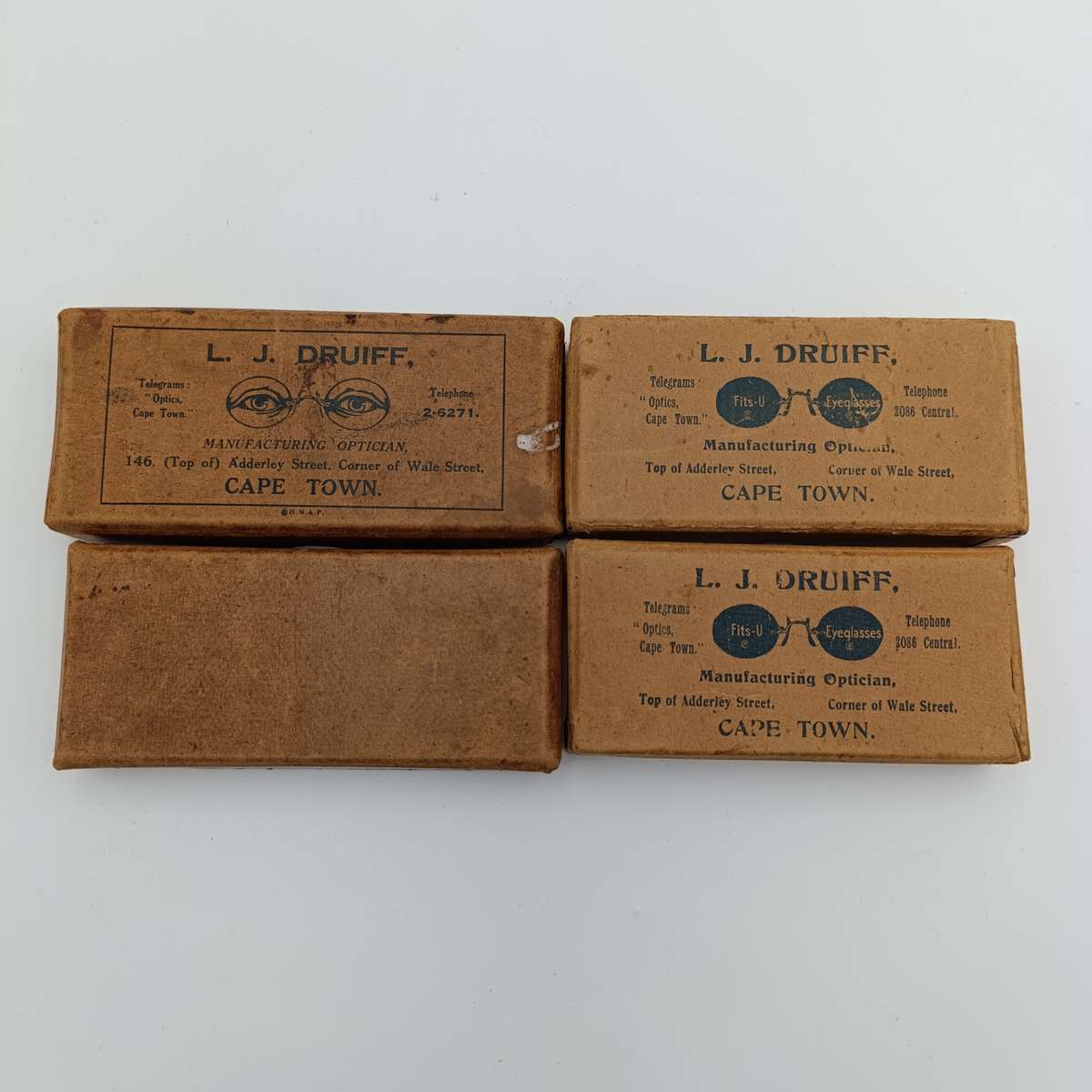 Pair of LJ Druiff Cape Town optician delivery boxes - vintage