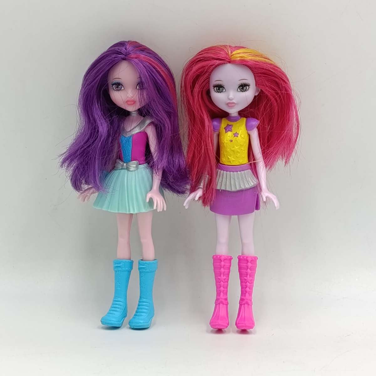 Two dolls with full outfits