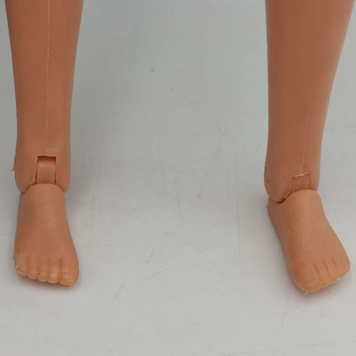 Two dolls with matted hair