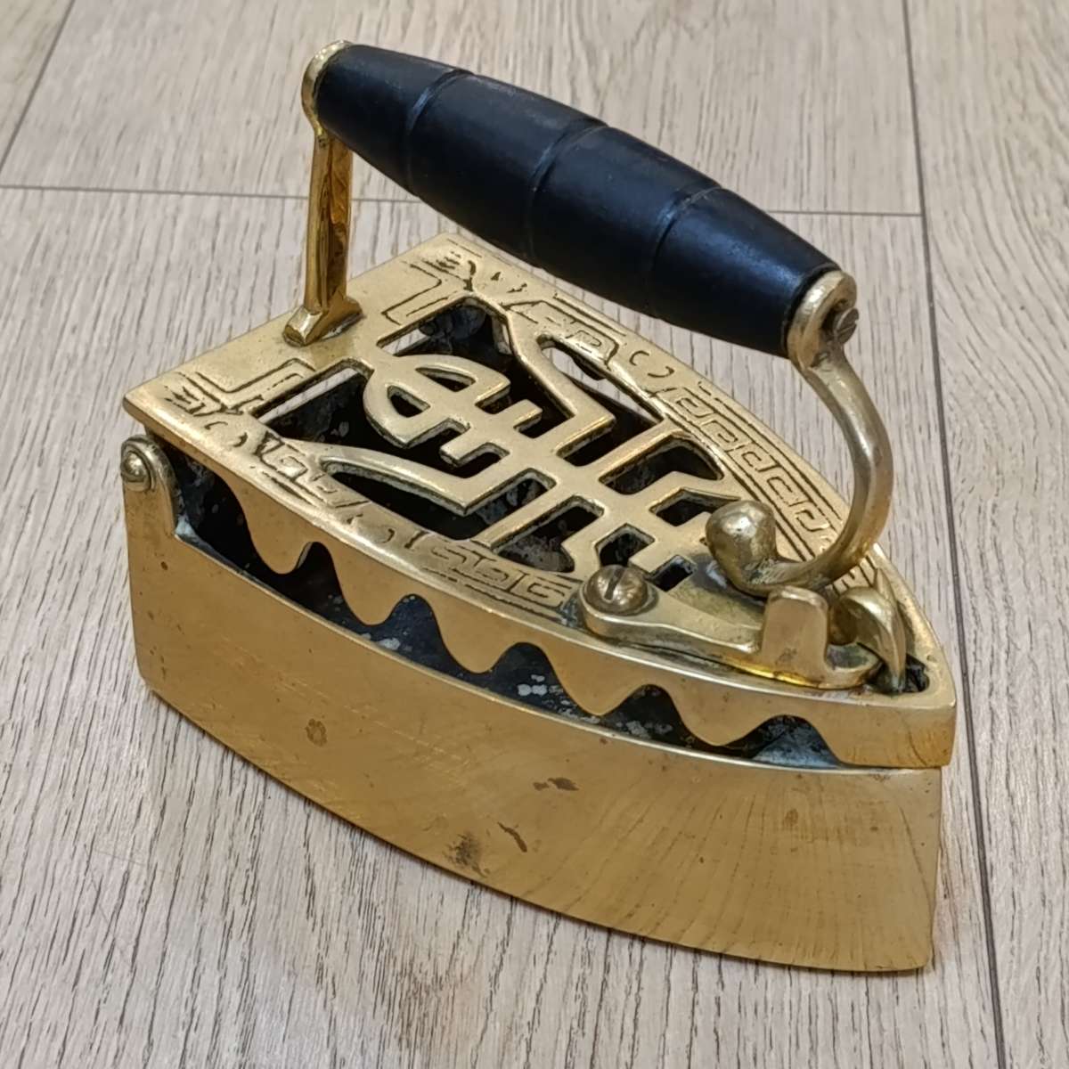 Antique brass sad iron