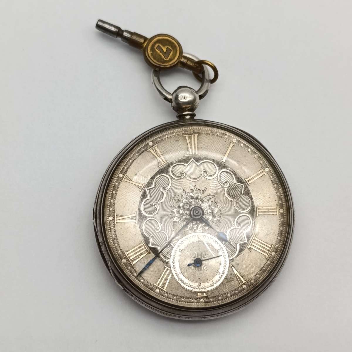 1860 Hallmarked sterling silver pocketwatch with key - runs and stops
