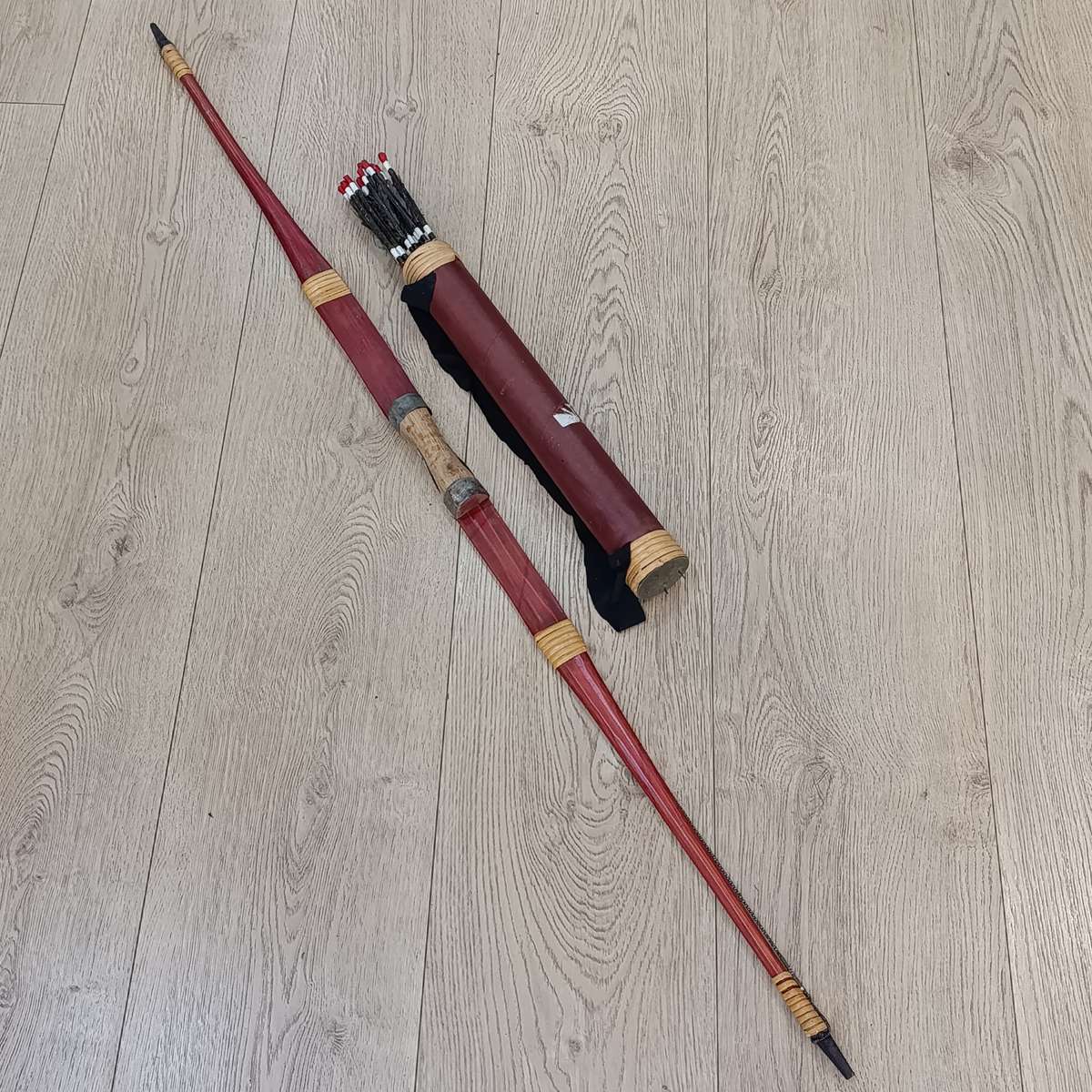 Handmade bow and arrows in quiver - possibly from Guinea