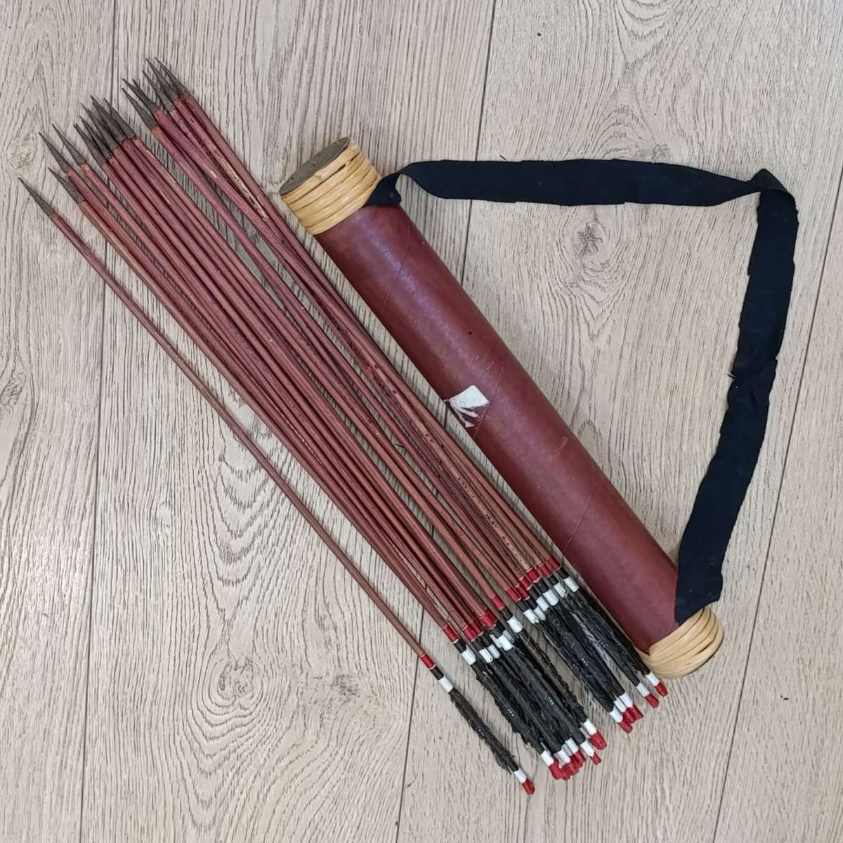 Handmade bow and arrows in quiver - possibly from Guinea