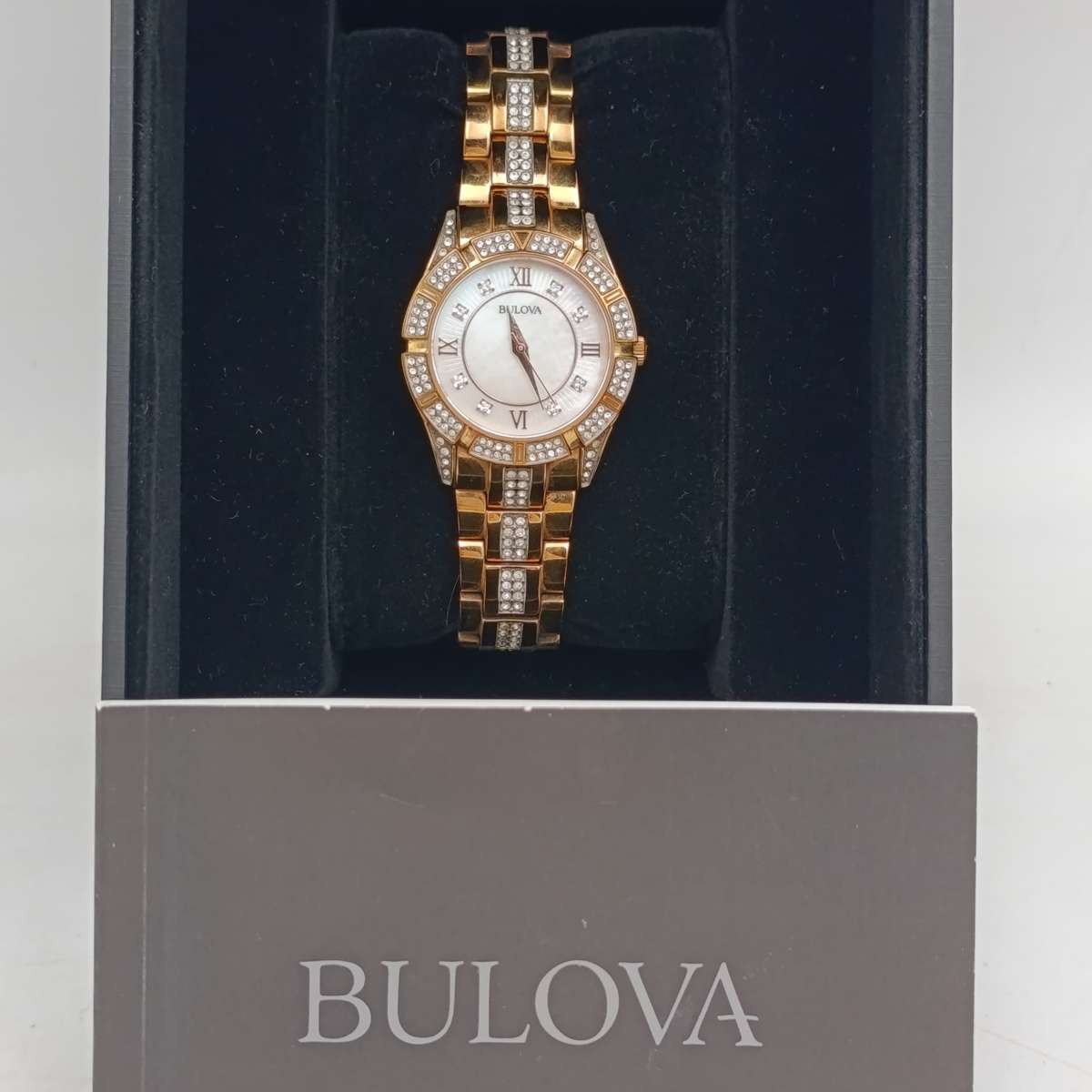 Bulova rose tone crystal ladies watch in box