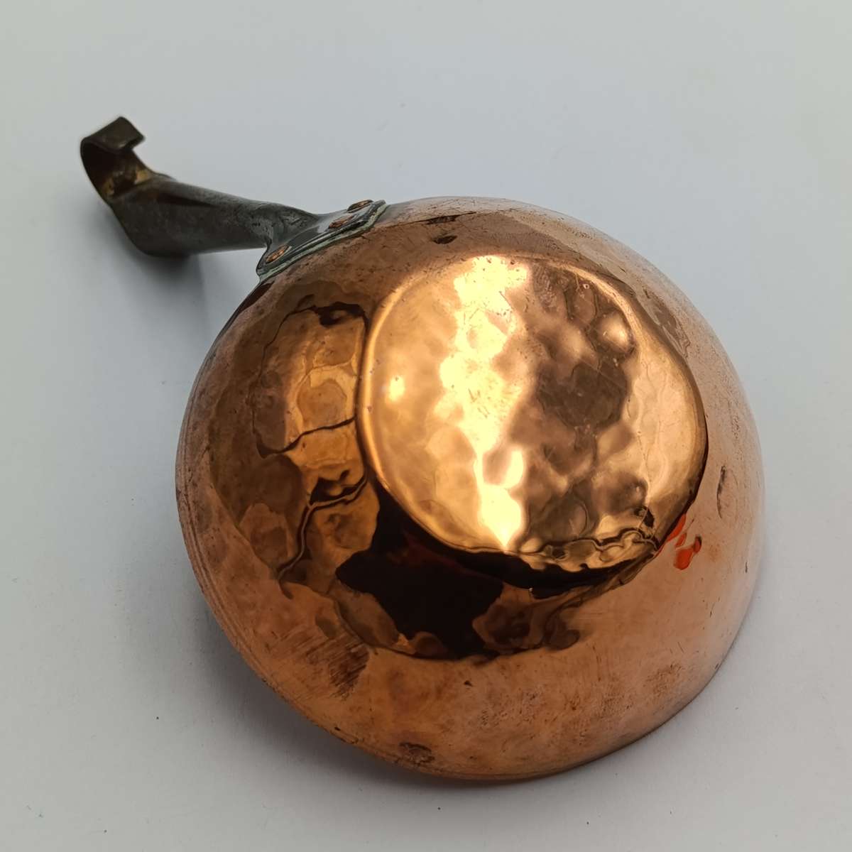 Antique Norwegian hammered copper measuring spoon