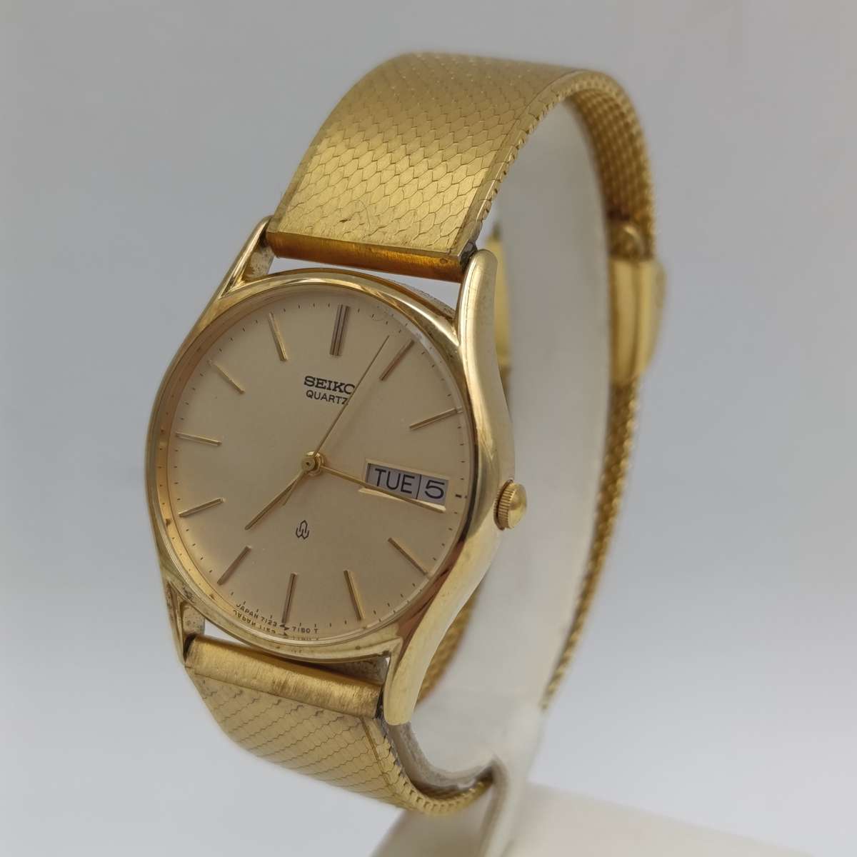 Vintage Seiko 7123-7090 Quartz gold colour men's watch with day/date - working