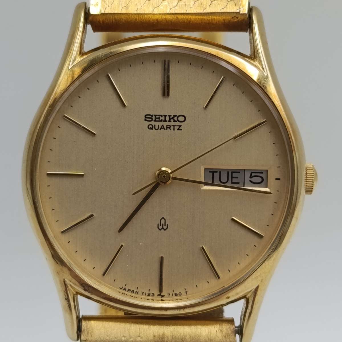 Vintage Seiko 7123-7090 Quartz gold colour men's watch with day/date - working