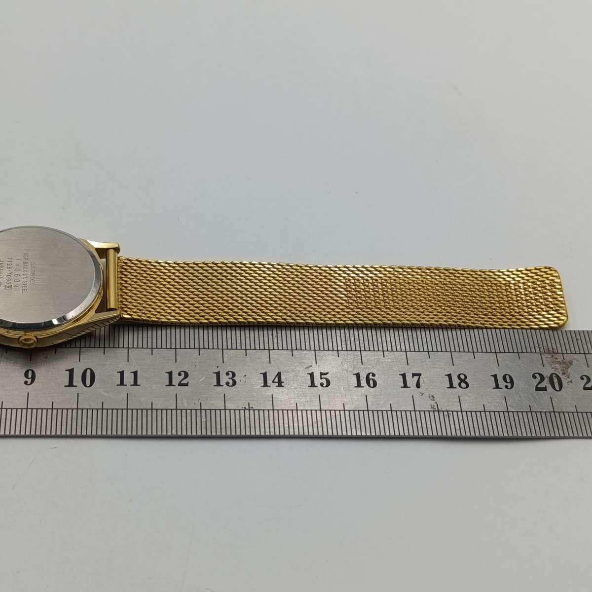 Vintage Seiko 7123-7090 Quartz gold colour men's watch with day/date - working