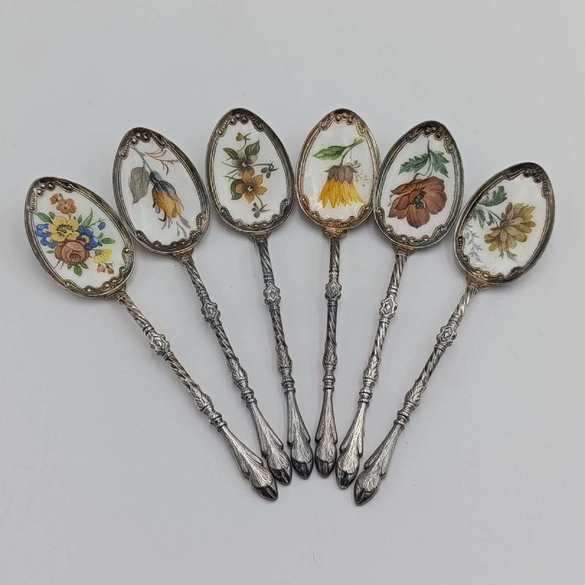 Set of 6 silverplated teaspoons with porcelain flower inlay design