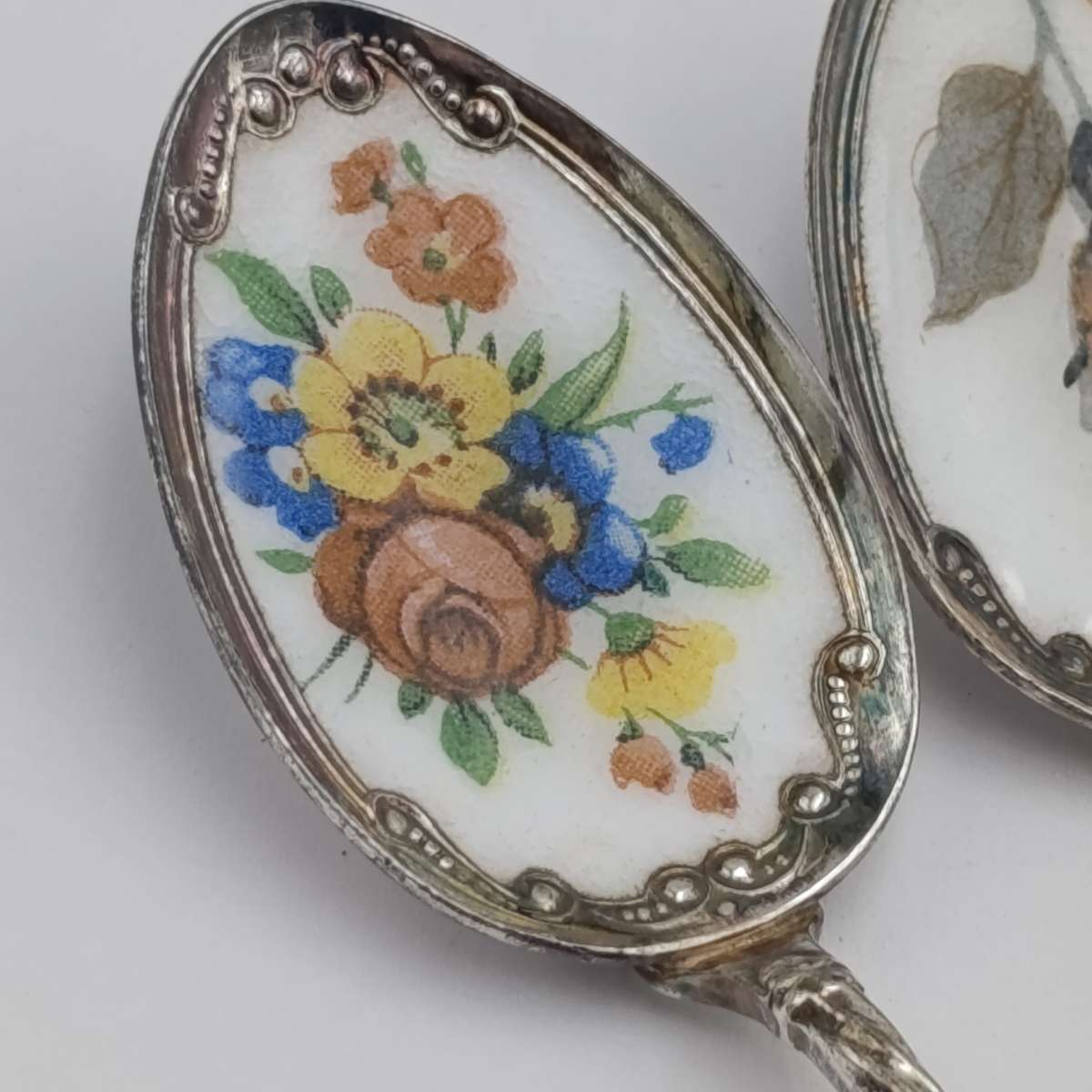 Set of 6 silverplated teaspoons with porcelain flower inlay design