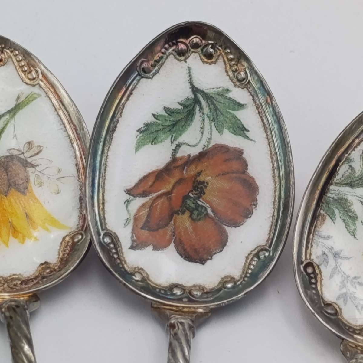 Set of 6 silverplated teaspoons with porcelain flower inlay design