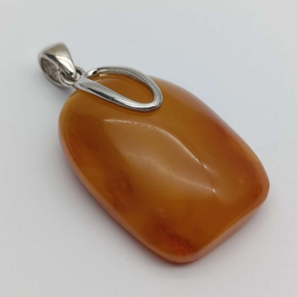 Piece of amber set in Sterling silver 16 gram