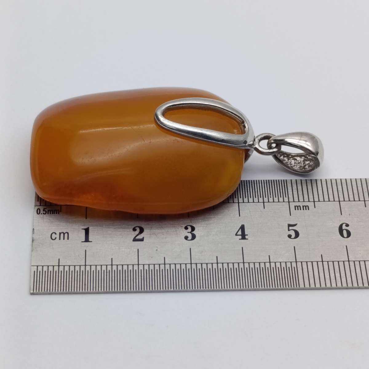Piece of amber set in Sterling silver 16 gram