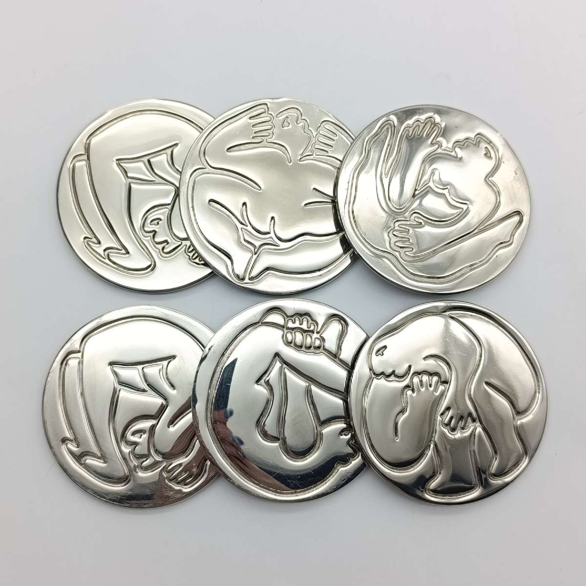 Set of 6 Carrol Boyes stainless steel wine coasters - in original box