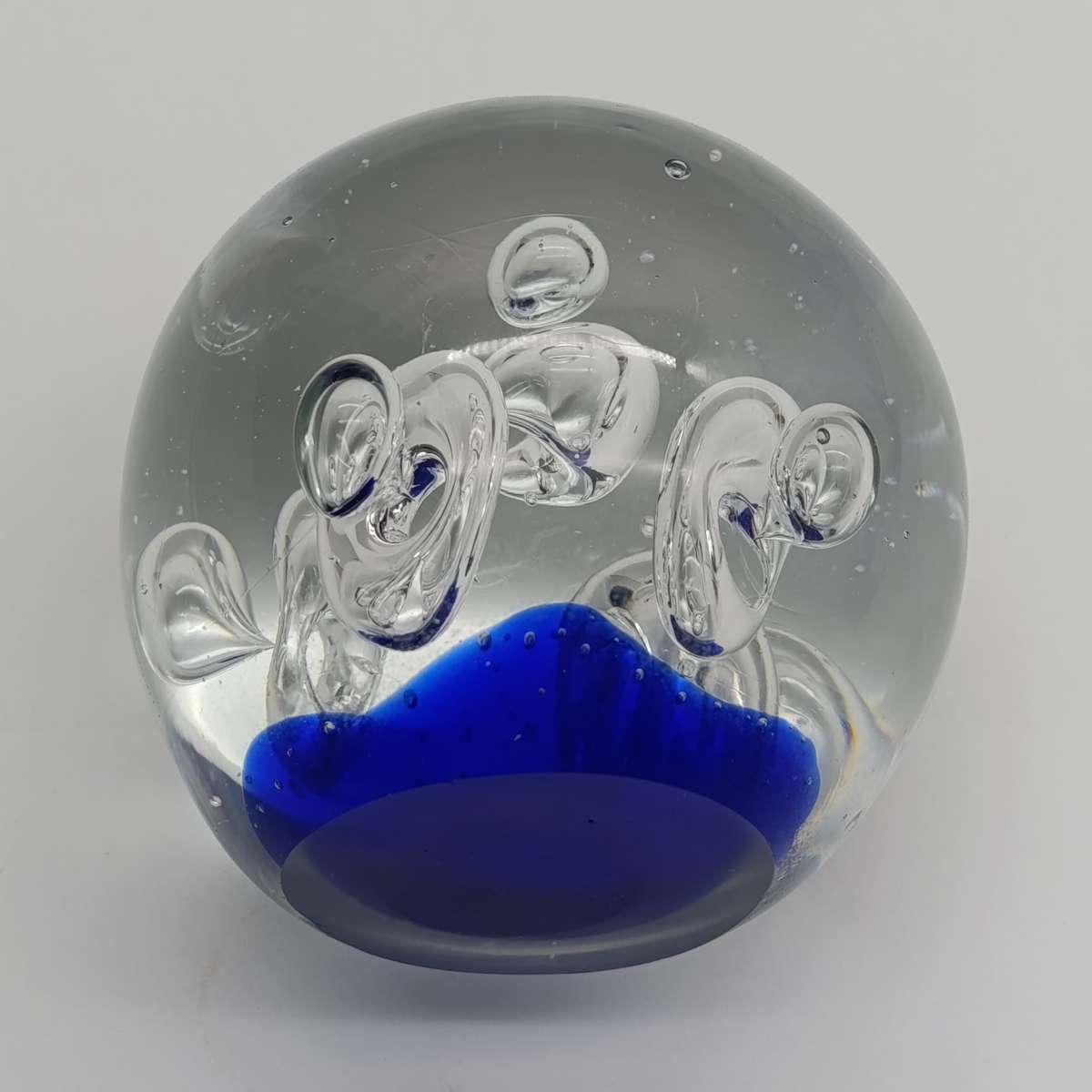 Vintage glass Paperweight with halo and drop designs inside