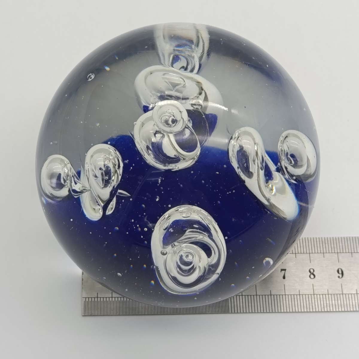 Vintage glass Paperweight with halo and drop designs inside