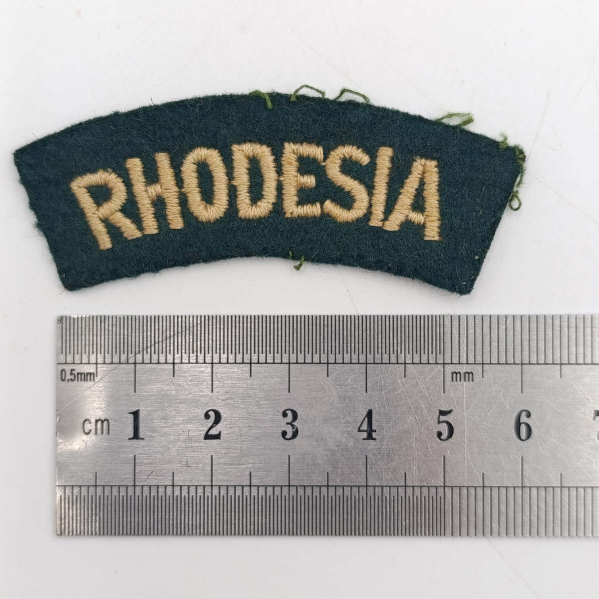 Pair of Rhodesian Army cloth shoulder titles
