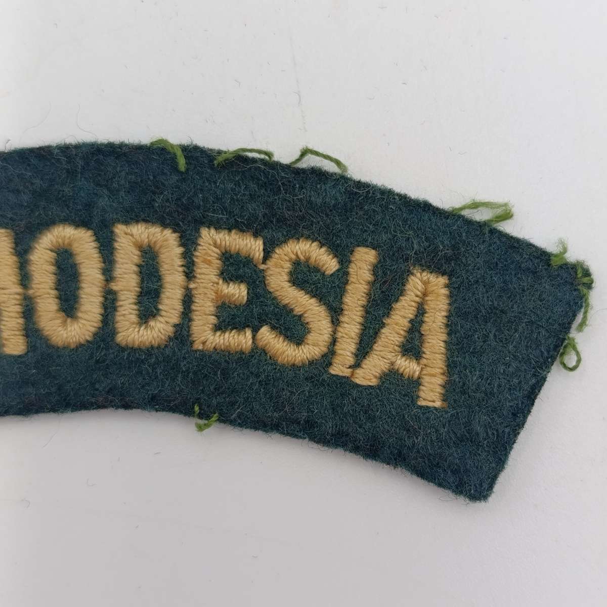 Pair of Rhodesian Army cloth shoulder titles