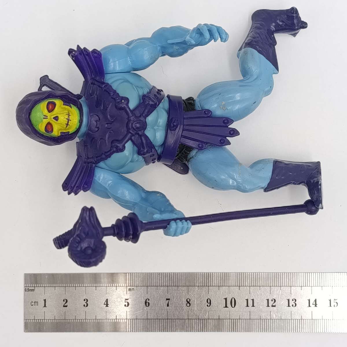 Vintage Masters of the Universe Skeletor figurine with weapons and accessories