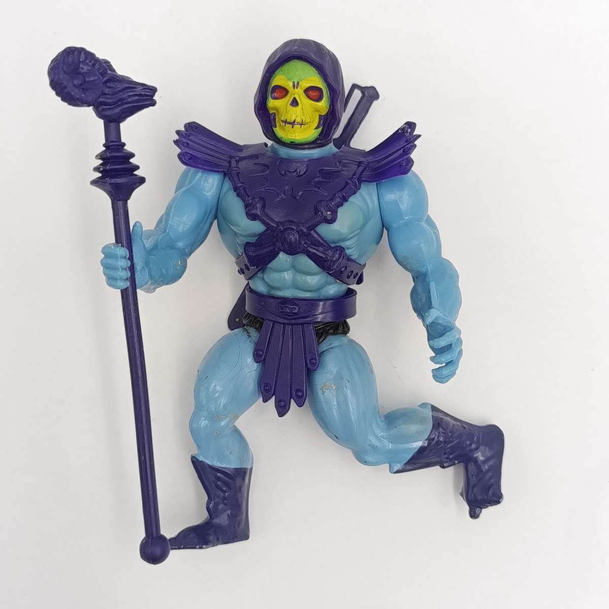 Vintage Masters of the Universe Skeletor figurine with weapons and accessories