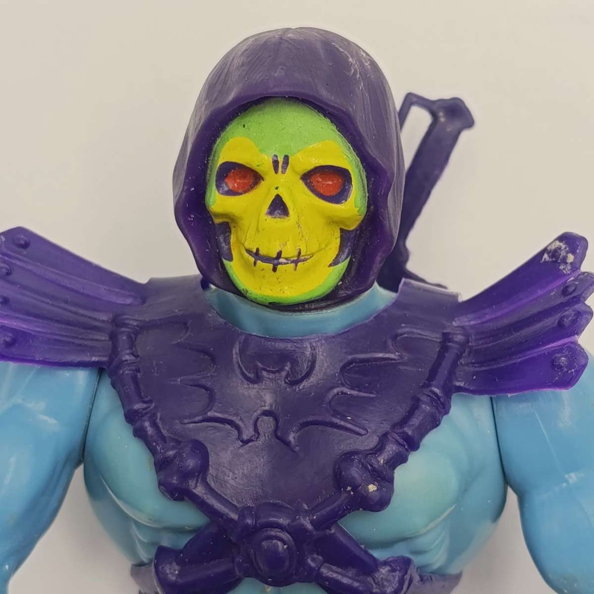 Vintage Masters of the Universe Skeletor figurine with weapons and accessories