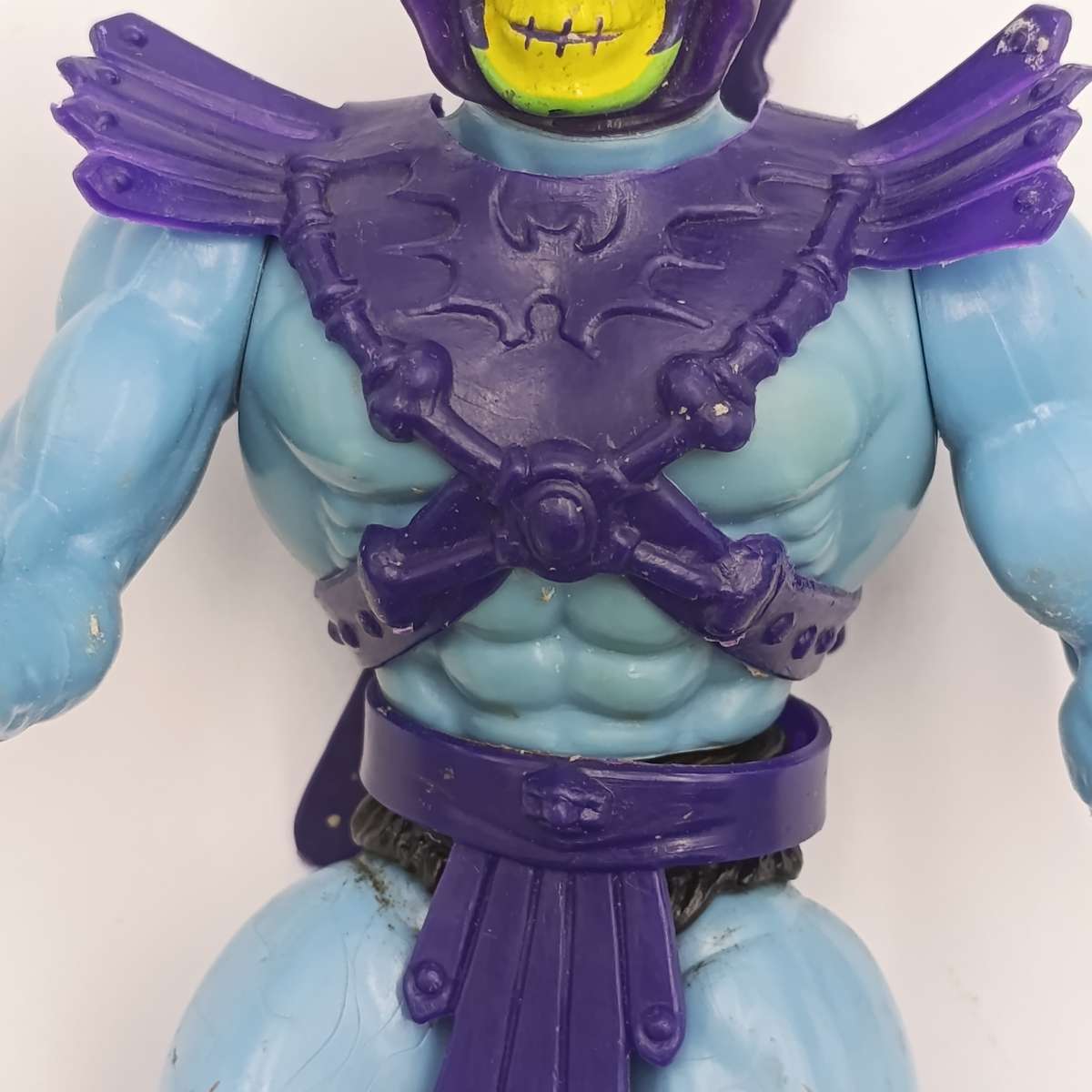Vintage Masters of the Universe Skeletor figurine with weapons and accessories