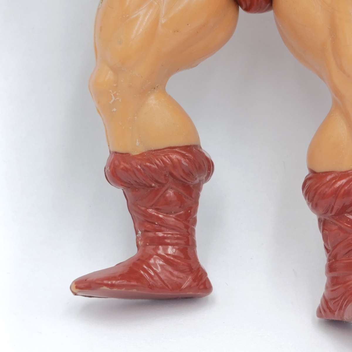 Vintage Masters of the Universe He-Man figurine with weapons and accessories