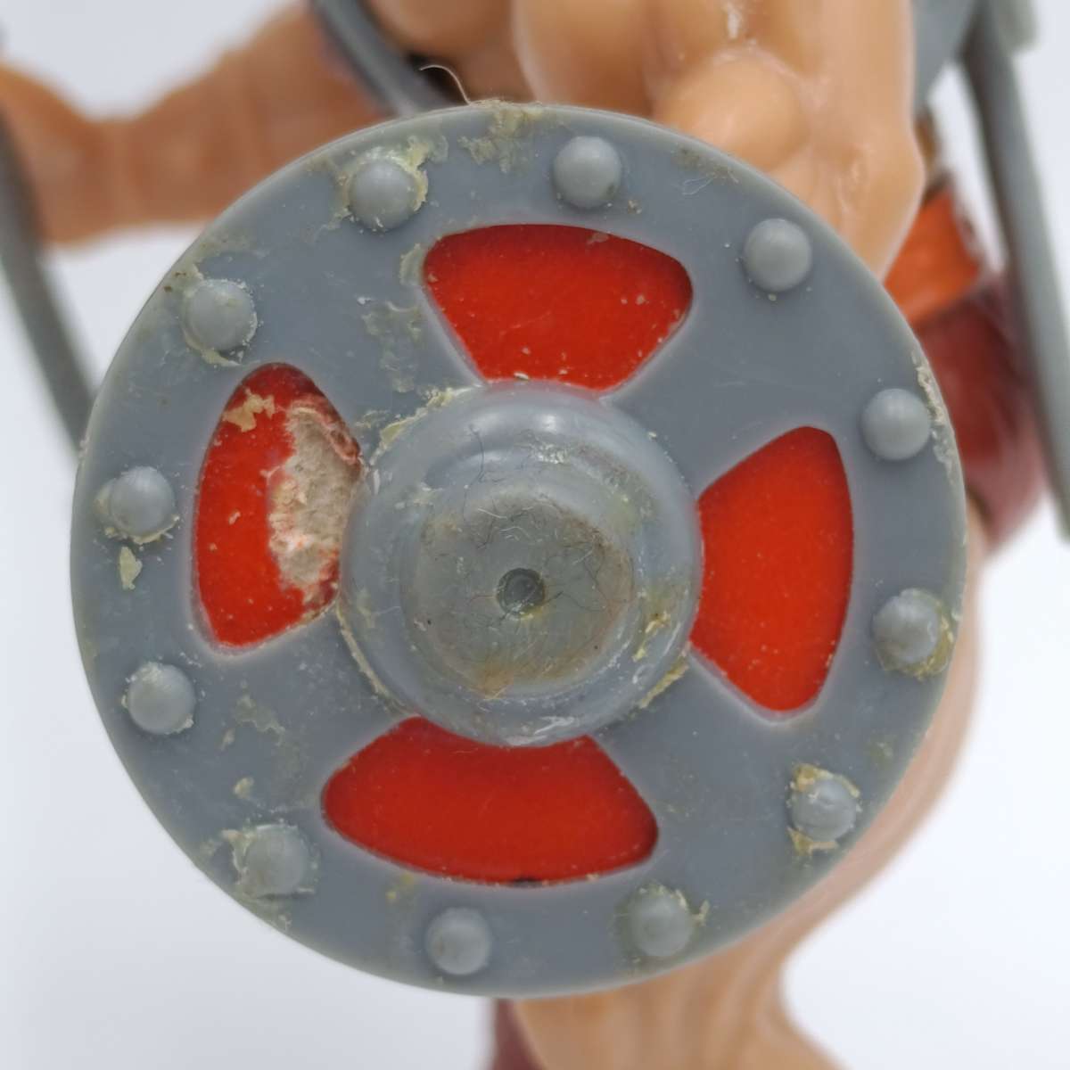 Vintage Masters of the Universe He-Man figurine with weapons and accessories