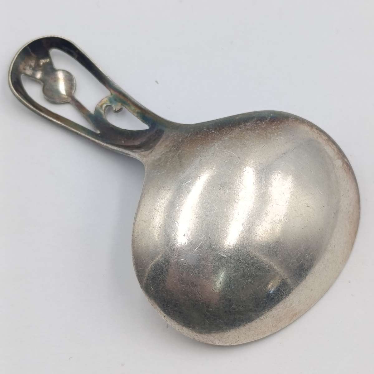 Antique Scottish silverplated tea caddy spoon with thistle design
