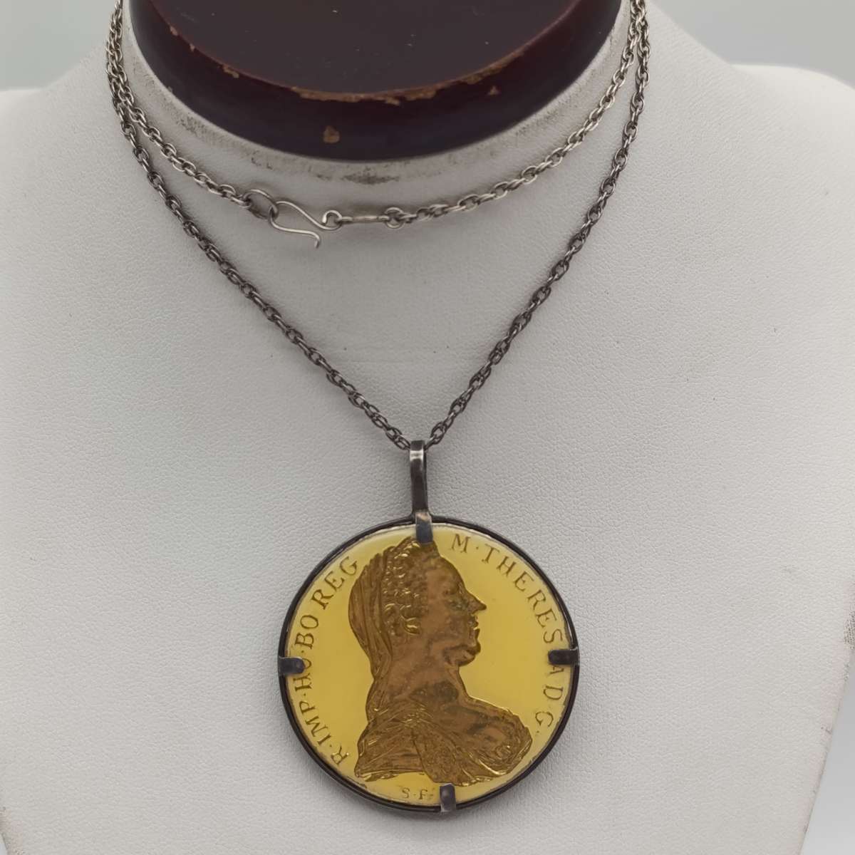 1780 Silver Maria Theresia Thaler Goldplated and epoxy in silver surround - with silver chair