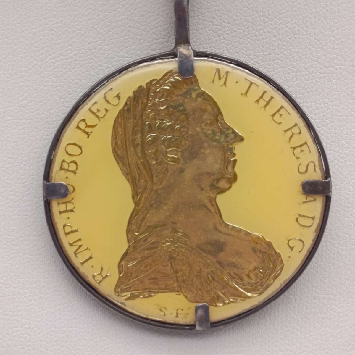 1780 Silver Maria Theresia Thaler Goldplated and epoxy in silver surround - with silver chair