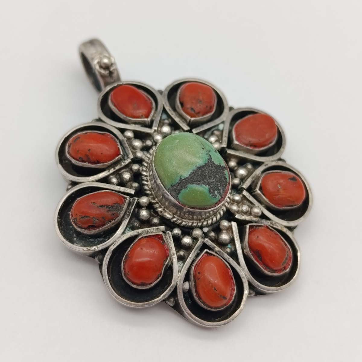 Sterling SIlver pendant with turquoise and red coral stone - weighs 29.1 grams