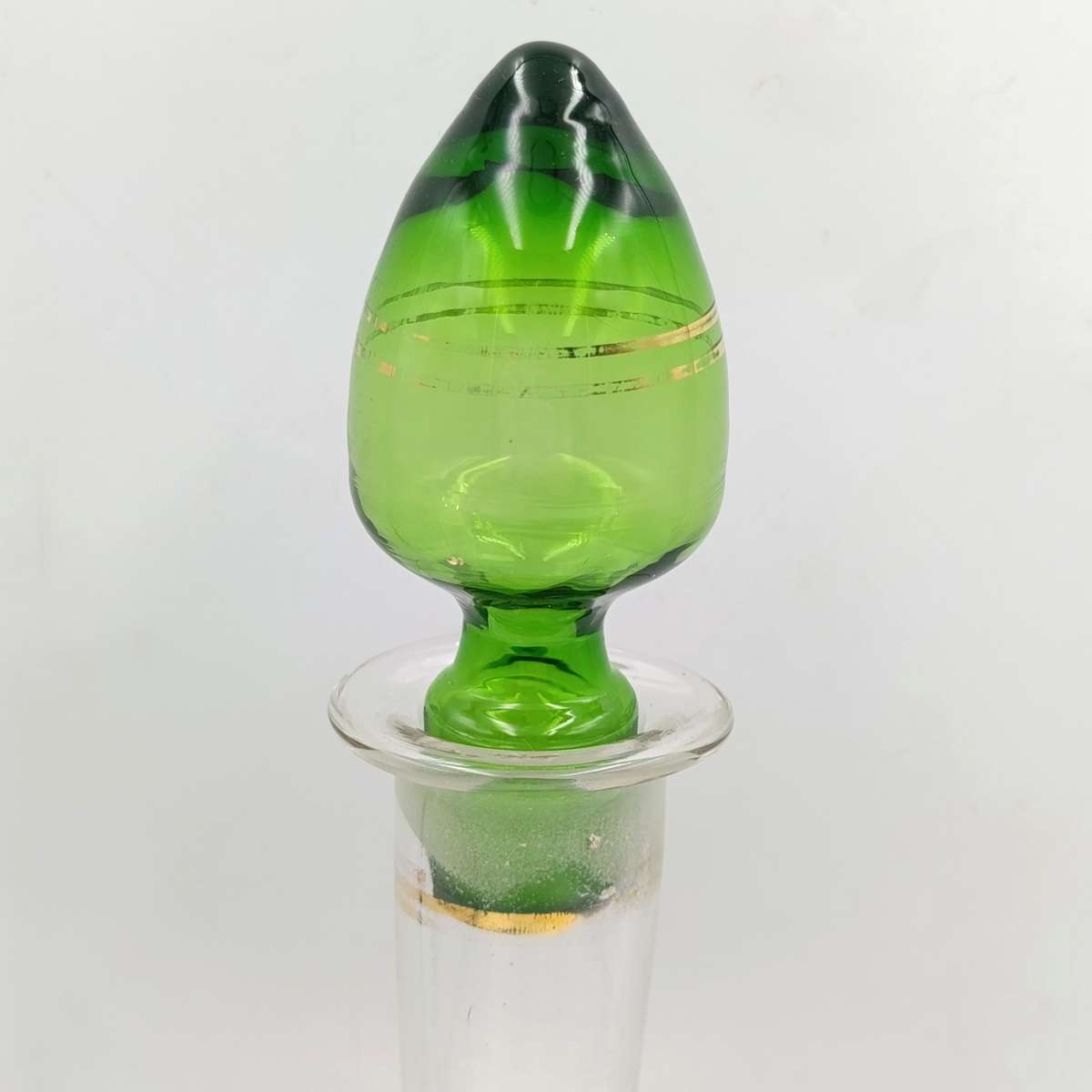 Beautiful vintage glass decanter with green glass top