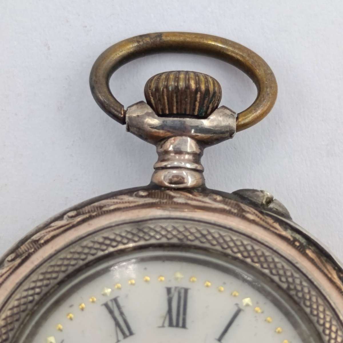 Antique 800 Silver ladies pocketwatch with gold decoration - runs and stops