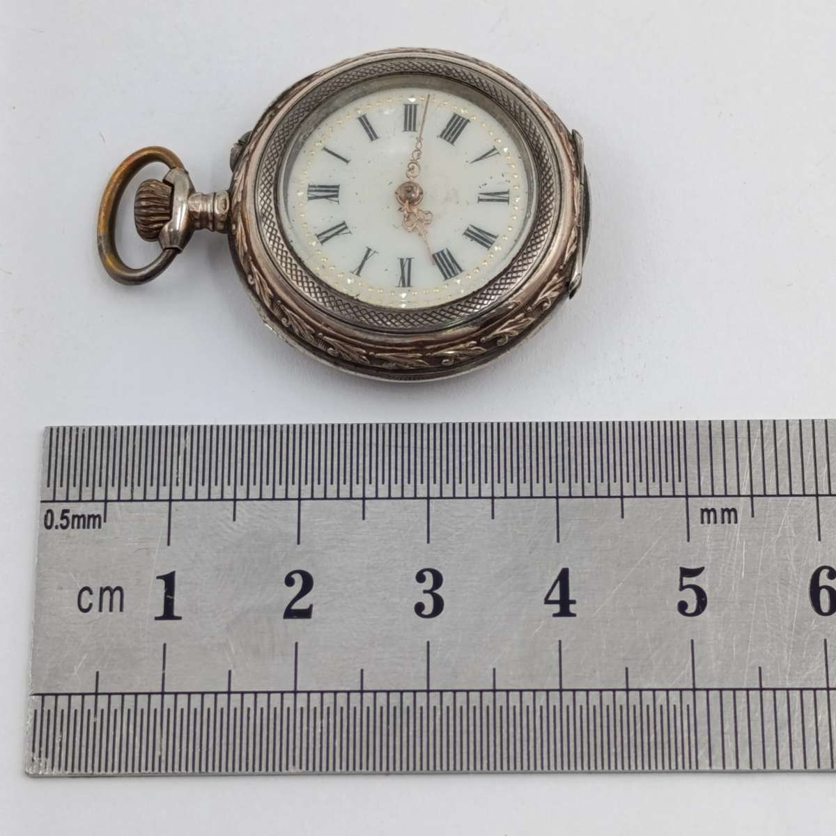 Antique 800 Silver ladies pocketwatch with gold decoration - runs and stops