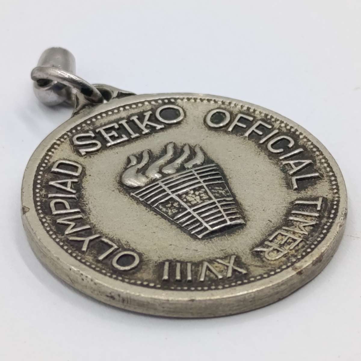 Seiko Kegving round - Official 18th Olympiad timekeeper