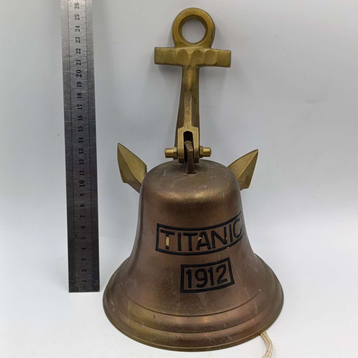 Vintage brass wall mount bell with achor mount - marked Titanic 1912