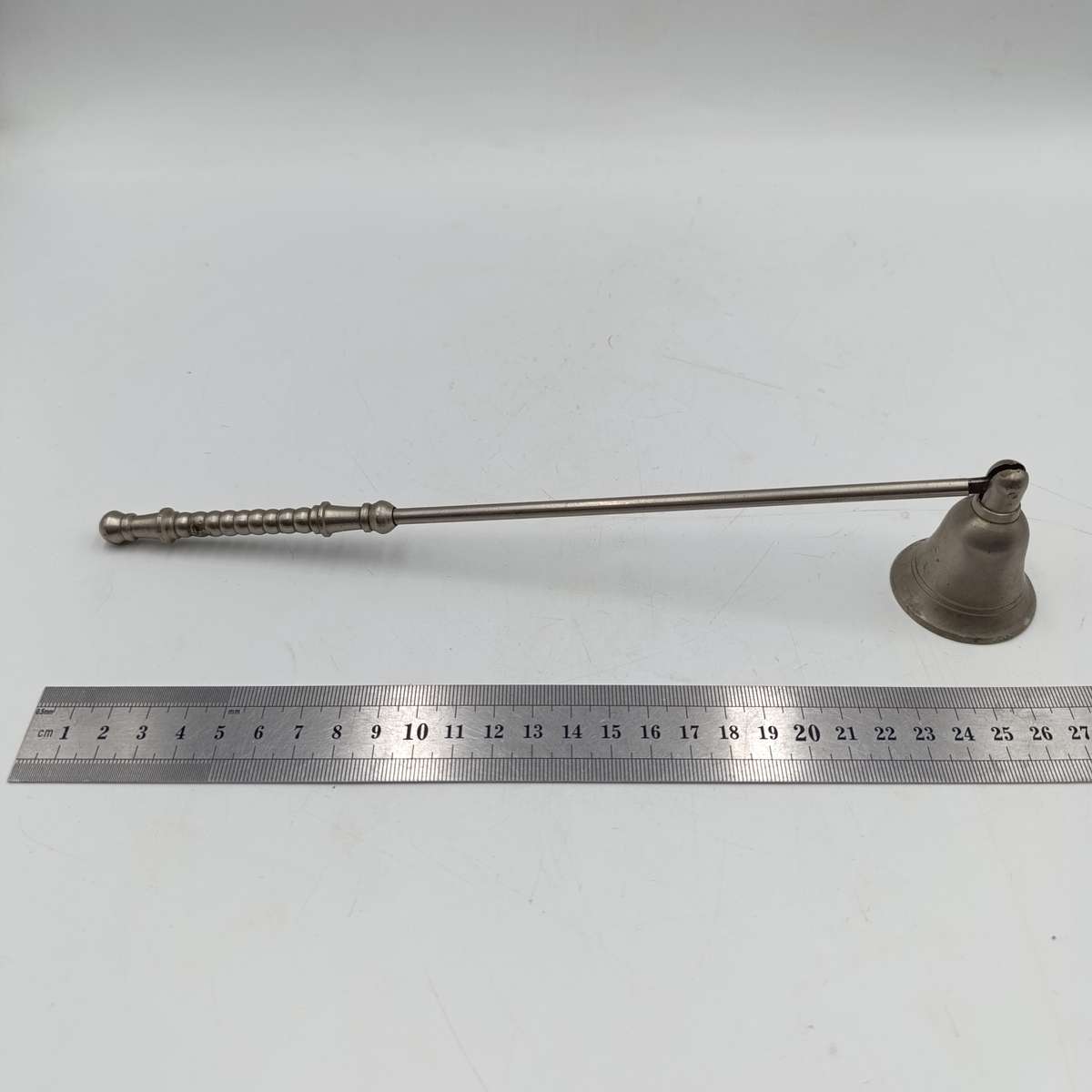 Vintage white brass candle snuffer