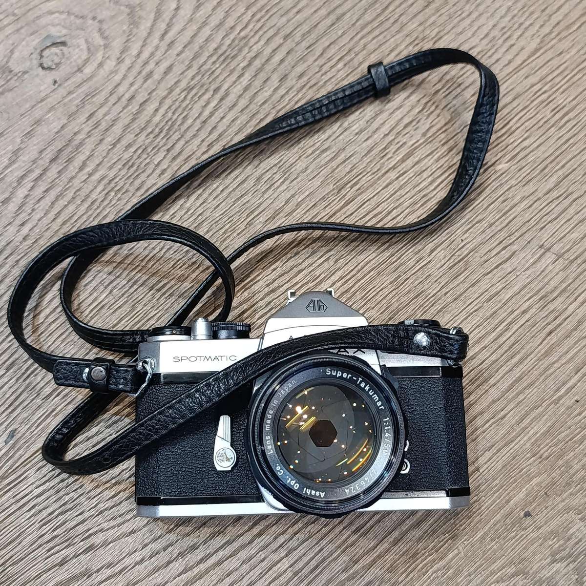 Vintage Pentax Spotmatic 35mm film camera with extra lenses and accessories in camera case